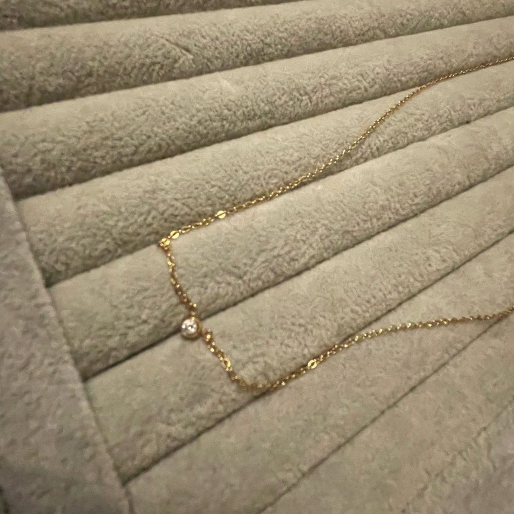 Brand new 14k necklace with stationary Diamond